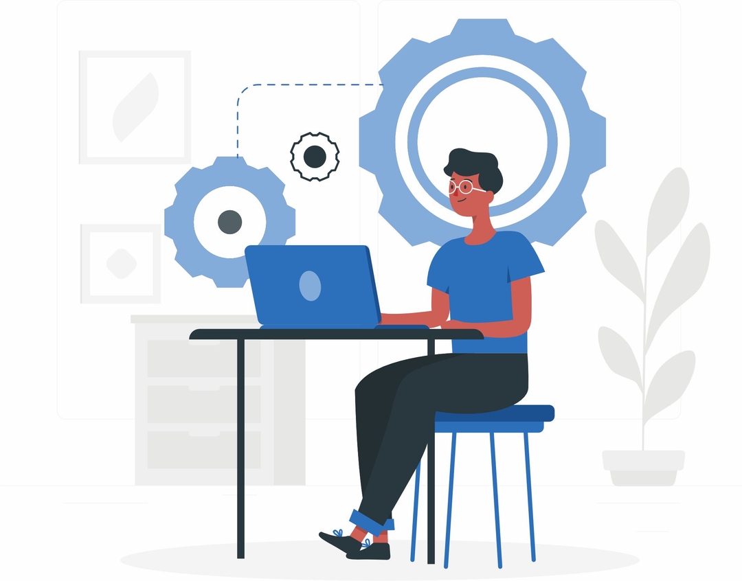 Clipart of a person working on an open laptop on a desk with gear icons in the background