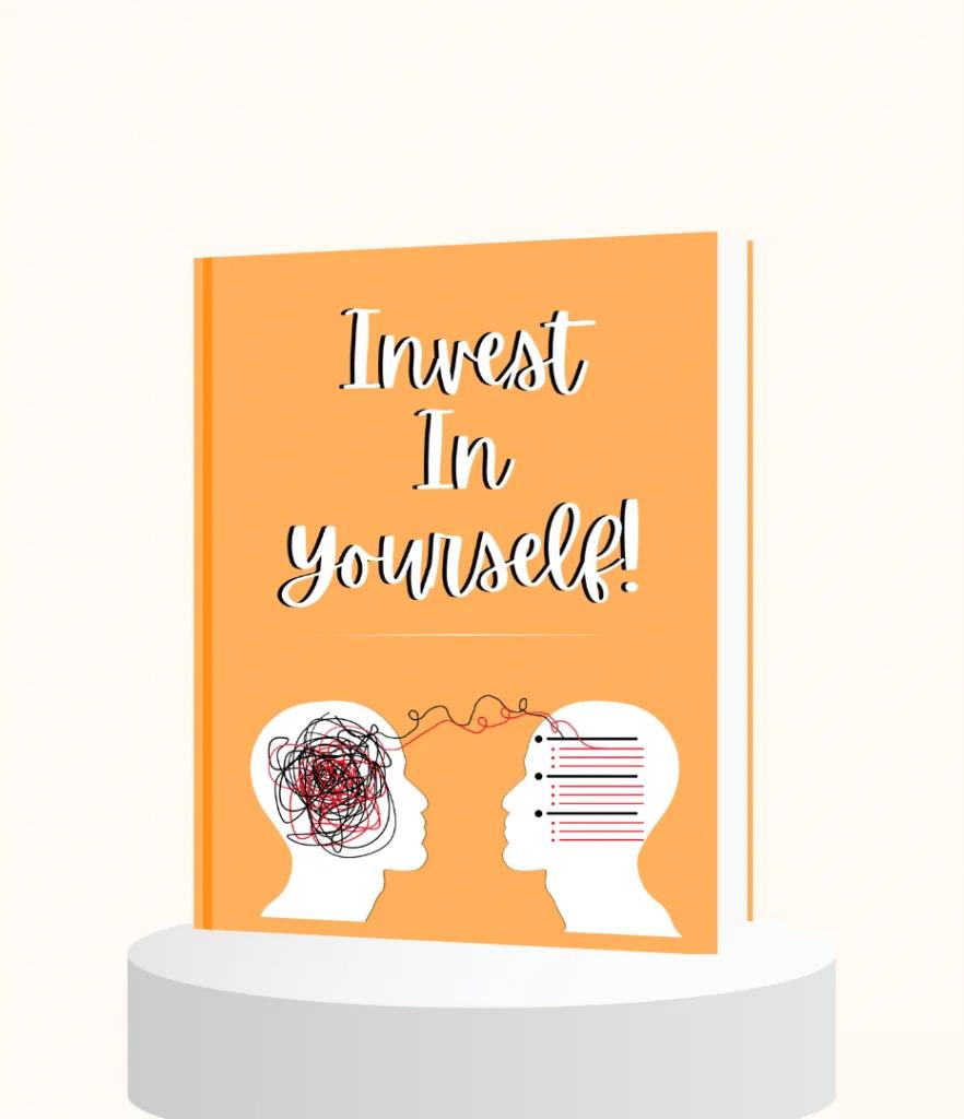 Image of an Invest in Yourself Journal created by Aswini Bajaj placed on top of a wooden base